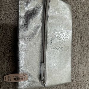 Victoria secret silver pouch.